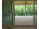 Spacious wooden deck overlooking a lush, green backyard at 2590 Silas Peak Ln, Apex, NC 27523