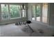 Bright dining room with large windows leading to outdoor deck at 2590 Silas Peak Ln, Apex, NC 27523
