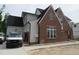 Beautiful home with brick and siding and attached garage providing both style and convenience at 2590 Silas Peak Ln, Apex, NC 27523