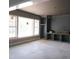Spacious living room with large windows and built-in shelving at 2590 Silas Peak Ln, Apex, NC 27523
