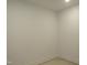This is an image of a simple room with white walls and trim at 2590 Silas Peak Ln, Apex, NC 27523