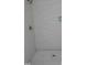 Clean and modern shower with new tile and fixtures at 2590 Silas Peak Ln, Apex, NC 27523