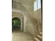 Modern staircase design with wood treads and black metal railings, bright natural light at 2590 Silas Peak Ln, Apex, NC 27523