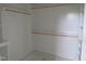 Walk-in closet featuring built-in shelving and ample storage space at 2590 Silas Peak Ln, Apex, NC 27523