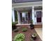 Inviting front porch with seating area, perfect for enjoying the outdoors at 282 W Thicket Dr, Angier, NC 27501