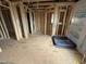 Unfinished bathroom framed, showing shower base and plumbing, ready for customization and personalization at 3017 Dog Rose Dr # 169, Durham, NC 27703