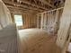 Exposed beams and stud framing of an interior ready to be the space of your dreams at 3017 Dog Rose Dr # 169, Durham, NC 27703