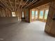 Unfinished interior with many windows to be a bright and spacious living area at 3017 Dog Rose Dr # 169, Durham, NC 27703