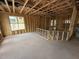 Exposed wood framing defines the spacious layout of this unfinished home interior at 3017 Dog Rose Dr # 169, Durham, NC 27703