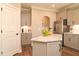 Stylish kitchen featuring gray cabinets, stainless steel appliances, and a granite island with bar seating at 3017 Dog Rose Dr # 169, Durham, NC 27703