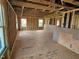 View of a living room under construction with exposed beams and plywood flooring at 3017 Dog Rose Dr # 169, Durham, NC 27703