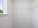 Walk-in closet with white wire shelving at 33 Celtic Ln, Lillington, NC 27546