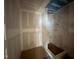 Compact bathroom featuring a modern shower with tasteful marble accents and awaiting final touches at 3324 Founding Place, Raleigh, NC 27612