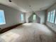 Unfinished bonus room featuring natural light and an architectural ceiling at 3324 Founding Place, Raleigh, NC 27612