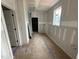 Hallway featuring plumbing access, awaiting finishing touches for a seamless transition at 3324 Founding Place, Raleigh, NC 27612