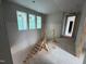 Unfinished room with staircase, windows and doorway visible at 3324 Founding Place, Raleigh, NC 27612