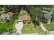 Aerial view of the home, long driveway, and landscaping at 3612 Griffice Mill Rd, Raleigh, NC 27610