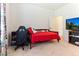 Bedroom featuring carpet, a window, and a door leading to the hallway at 3612 Griffice Mill Rd, Raleigh, NC 27610
