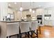 Gourmet kitchen with stainless appliances, granite counters, and a breakfast bar at 3612 Griffice Mill Rd, Raleigh, NC 27610