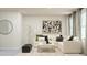 Relaxing living room with a comfortable sofa, modern decor, and a large window at 4017 Shadbush St, Raleigh, NC 27616