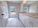 Beautiful bathroom with double vanity, tile floors, and walk-in shower at 428 Duncan Creek Rd # 157, Lillington, NC 27546