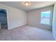 Bedroom with neutral carpet, light gray walls, and walk in closet at 428 Duncan Creek Rd # 157, Lillington, NC 27546