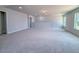 Large bonus room upstairs featuring neutral carpet and lots of natural light at 428 Duncan Creek Rd # 157, Lillington, NC 27546