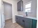 Gray cabinets and granite counters featured in a well-lit utility kitchen at 428 Duncan Creek Rd # 157, Lillington, NC 27546