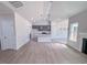 Bright open-concept living room with vaulted ceilings and sleek finishes at 428 Duncan Creek Rd # 157, Lillington, NC 27546