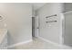 Bathroom with double towel rack and walk-in shower, vanity on the left with drawers at 4418 Gallatree Ln, Raleigh, NC 27616
