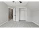 Bedroom features a standard closet and a door leading to a stairway at 4418 Gallatree Ln, Raleigh, NC 27616
