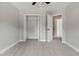 Bedroom featuring carpet and neutral paint along with a closet and a door to another room at 4418 Gallatree Ln, Raleigh, NC 27616