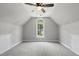 Bonus room featuring neutral colors, carpet, a ceiling fan, and a window at 4418 Gallatree Ln, Raleigh, NC 27616