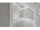 Bonus room features neutral colors, carpet, a ceiling fan, and a window at 4418 Gallatree Ln, Raleigh, NC 27616