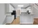 Modern kitchen featuring granite countertops and stainless steel appliances at 4418 Gallatree Ln, Raleigh, NC 27616