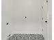 Laundry room with black and white patterned tile flooring at 4418 Gallatree Ln, Raleigh, NC 27616