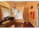 Bathroom featuring a soaking tub, stand up shower, and vanity with bowl sink at 501 Bellmeade Bay Dr, Durham, NC 27703