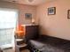 Bedroom featuring a sofa and window with bird-themed curtains at 501 Bellmeade Bay Dr, Durham, NC 27703