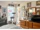 Bright bedroom with a window, a pet tower, and a dresser at 501 Bellmeade Bay Dr, Durham, NC 27703