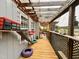 Enclosed deck with wooden floors, cat themed decor, and natural light at 501 Bellmeade Bay Dr, Durham, NC 27703