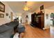Open-concept living room with vaulted ceiling, wood floors, and access to other rooms at 501 Bellmeade Bay Dr, Durham, NC 27703