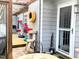 Enclosed outdoor structure with wooden deck, tires and milk crate shelves at 501 Bellmeade Bay Dr, Durham, NC 27703