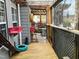 Enclosed outdoor structure with wooden deck and pet amenities at 501 Bellmeade Bay Dr, Durham, NC 27703