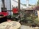 Enclosed outdoor space with plants, seating, and view of backyard at 501 Bellmeade Bay Dr, Durham, NC 27703