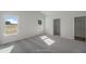 Bright bedroom with large windows and neutral carpeting; a relaxing and inviting space at 545 Beacon Hill Rd # 32, Lillington, NC 27546
