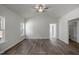 Spacious bedroom with ceiling fan and windows that provide plenty of natural light at 545 Beacon Hill Rd # 32, Lillington, NC 27546