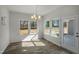 A dining room with wood floors and a glass door leading to outdoor space at 545 Beacon Hill Rd # 32, Lillington, NC 27546