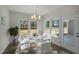 Bright dining room with a view to the yard and a glass door leading to outdoor space at 545 Beacon Hill Rd # 32, Lillington, NC 27546