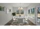 Dining room featuring hardwood floors, natural light and modern decor at 545 Beacon Hill Rd # 32, Lillington, NC 27546
