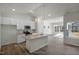 Beautiful modern kitchen with stainless steel appliances and an island with stone countertops at 545 Beacon Hill Rd # 32, Lillington, NC 27546